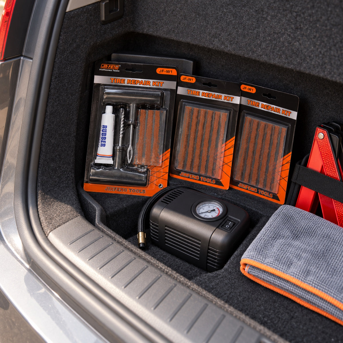 RoadReady tire repair kit stored in a car trunk